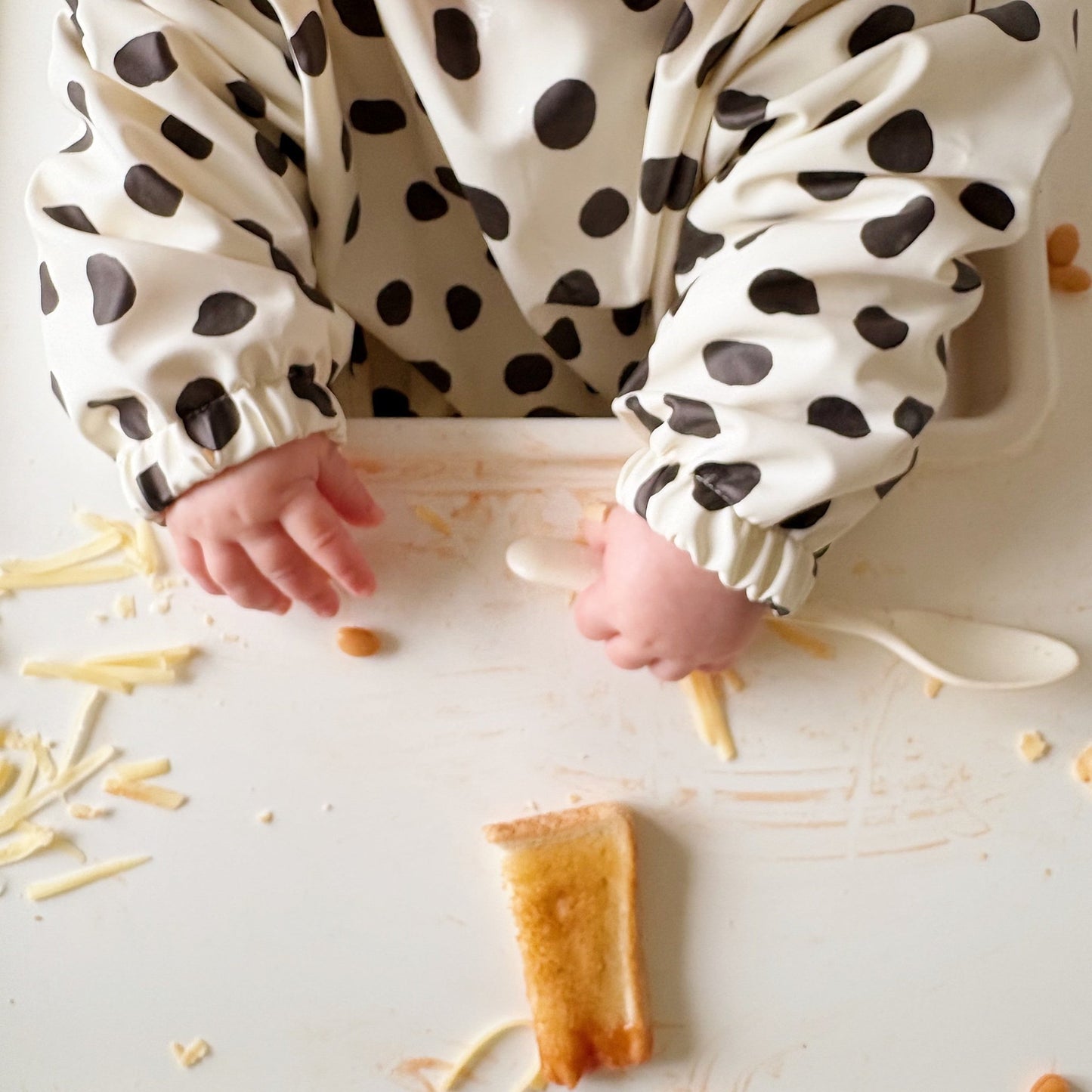 Long Sleeved Baby Bib - Spotty print - Edie And I