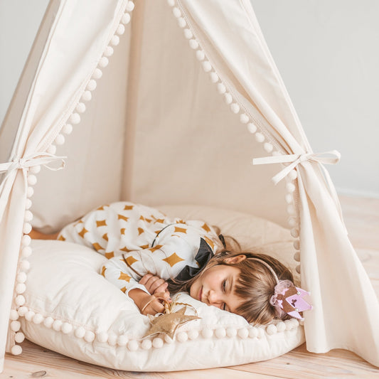 MINICAMP Large Floor Cushion With Pom Poms in Ecru - Edie And I