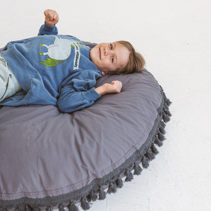 MINICAMP Large Floor Cushion With Tassels in Grey - Edie And I